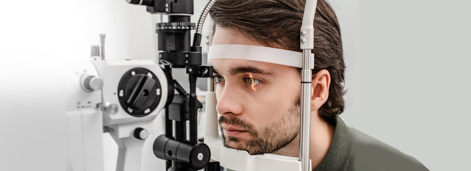 young man during eye exam in Clay